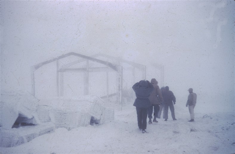 Typical white-out working conditions. The frame for the garage is shown on the left. Sept 1955.