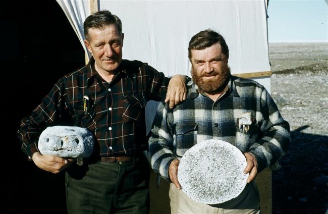 L to R: Quist and Christopherson holding prehistoric bones. June 1955.