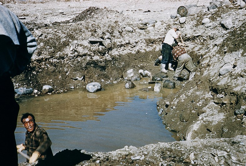 Early days. Water in the excavation for the base of the dopplar antenna tower. June 1956.