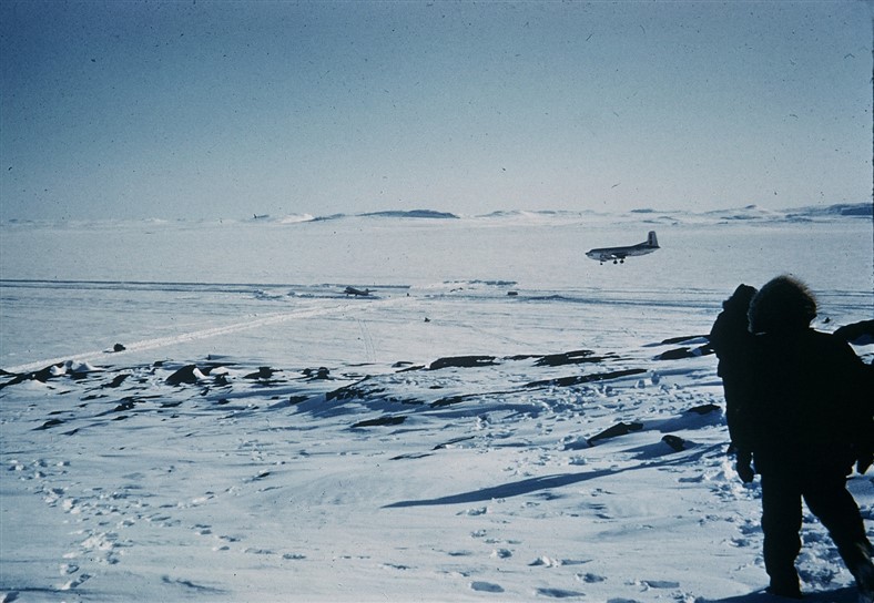 USAF C-124 transport plane landing on the newly built ice airstrip. April 1955.