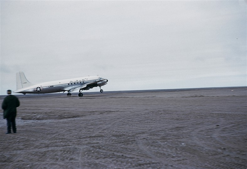 Gen Twinning's DC-6 landing on FOX-1's 3500 foot strip. Aug 1956.