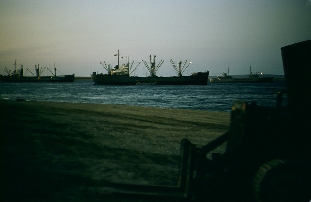 Sealift convoy unloading at 11 PM. August 1956.