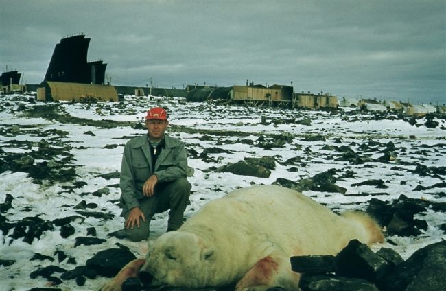 M. S. Cheever, with his signature red cap and the bear. Aug 1957.