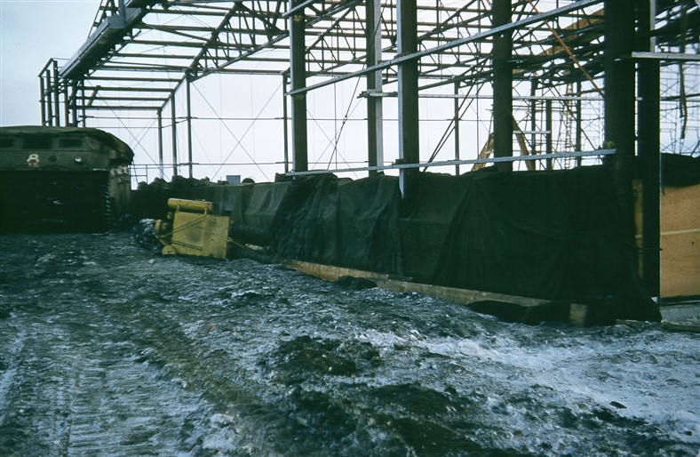 Pouring the concrete for the hanger walls. Oct 1955.